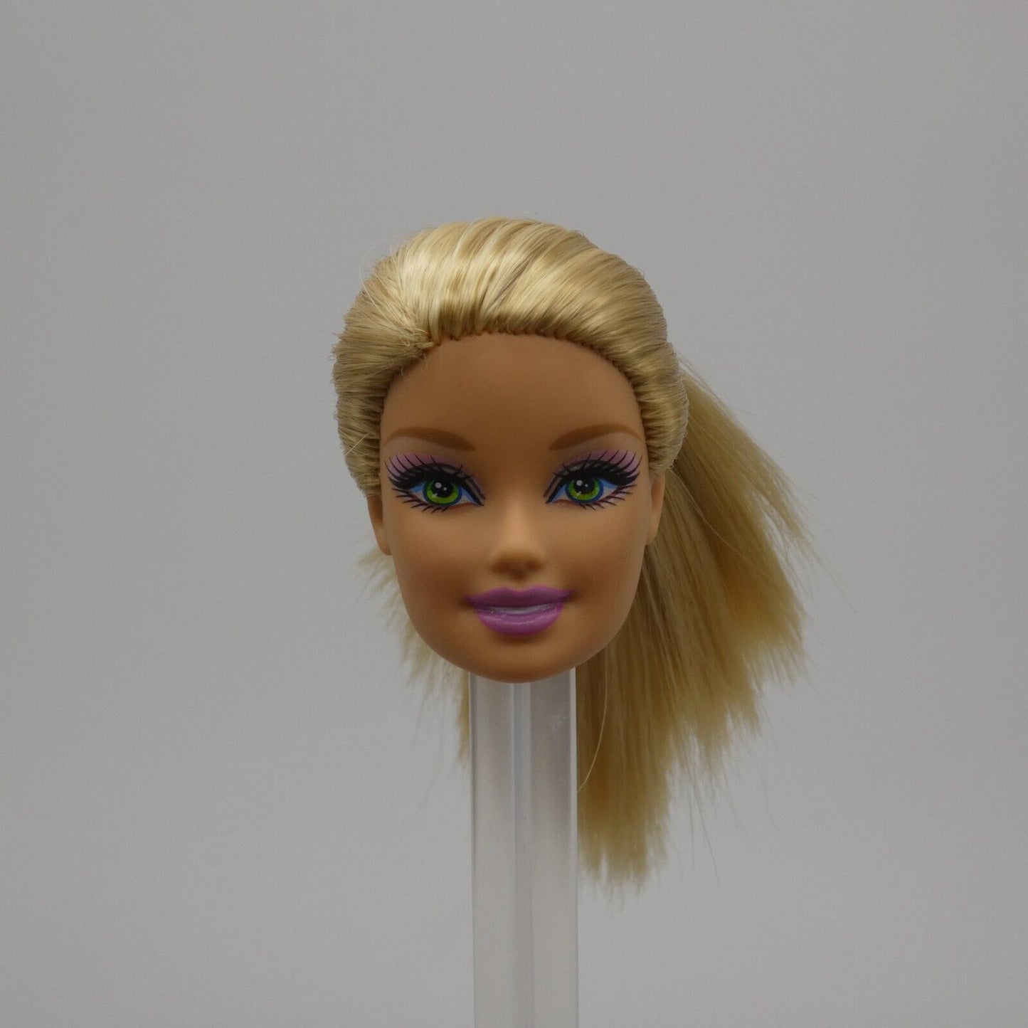 Barbie Doll Generation Girl CEO Face Bright Green Eyes Blonde Light Skin Tone