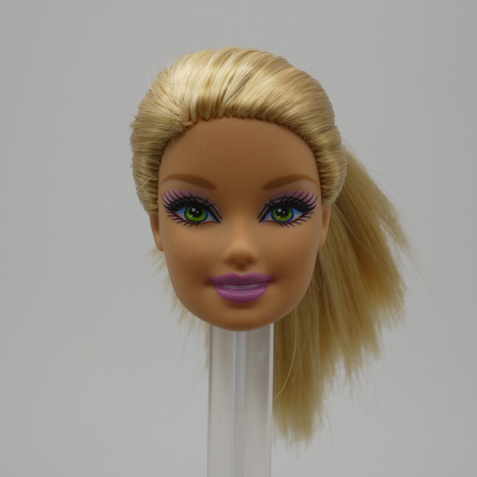 Barbie Doll Generation Girl CEO Face Bright Green Eyes Blonde Light Skin Tone