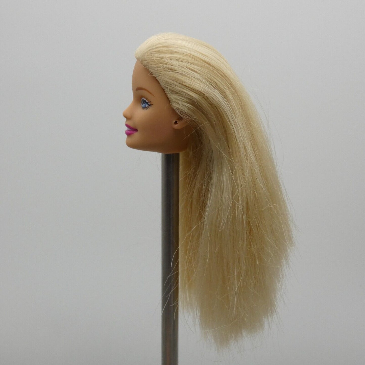 Barbie Doll Head Generation Girl CEO Face Blonde Hair Blue Eyes Light Skin