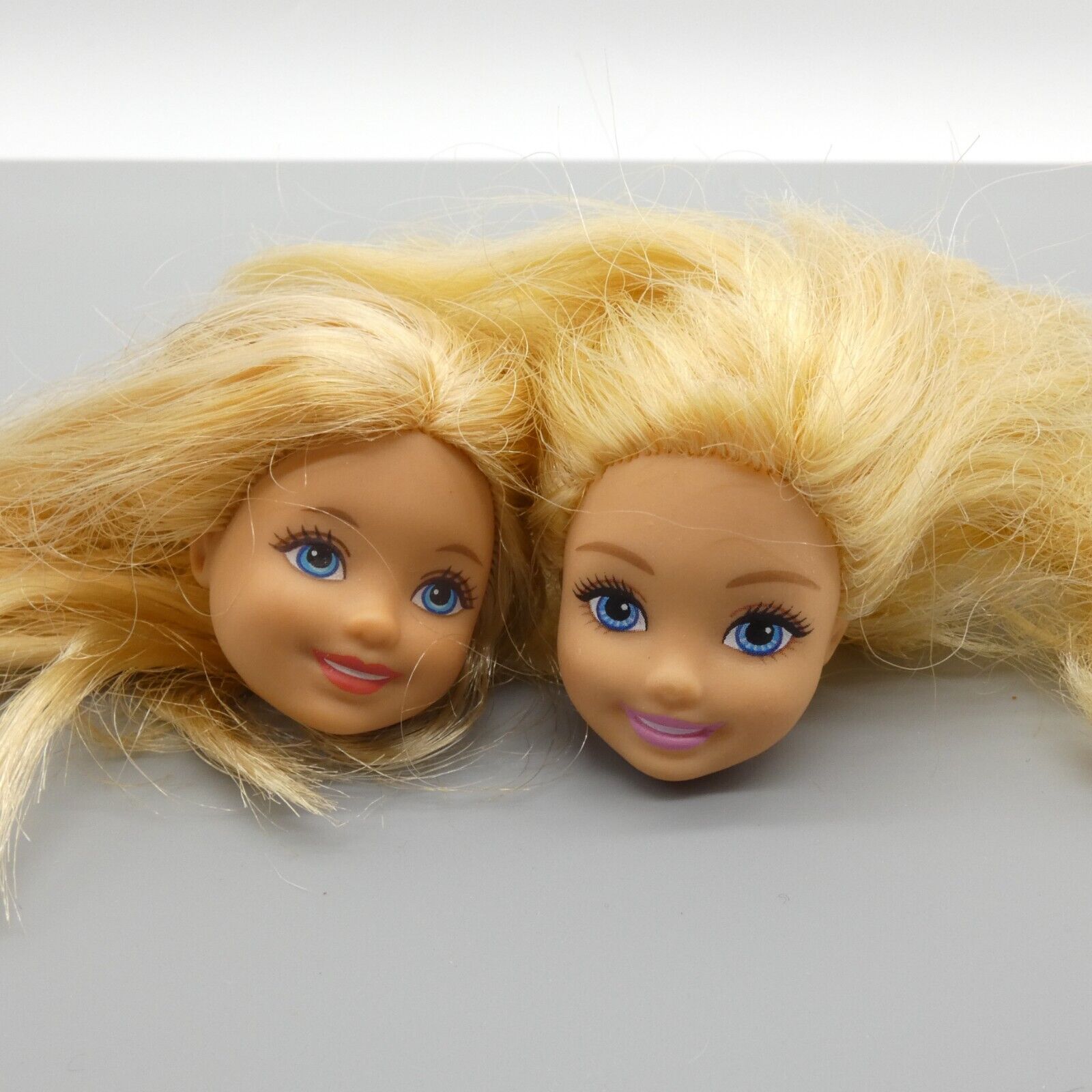 Barbie Chelsea Doll Head Lot of 2 Blonde Hair Mattel Kelly