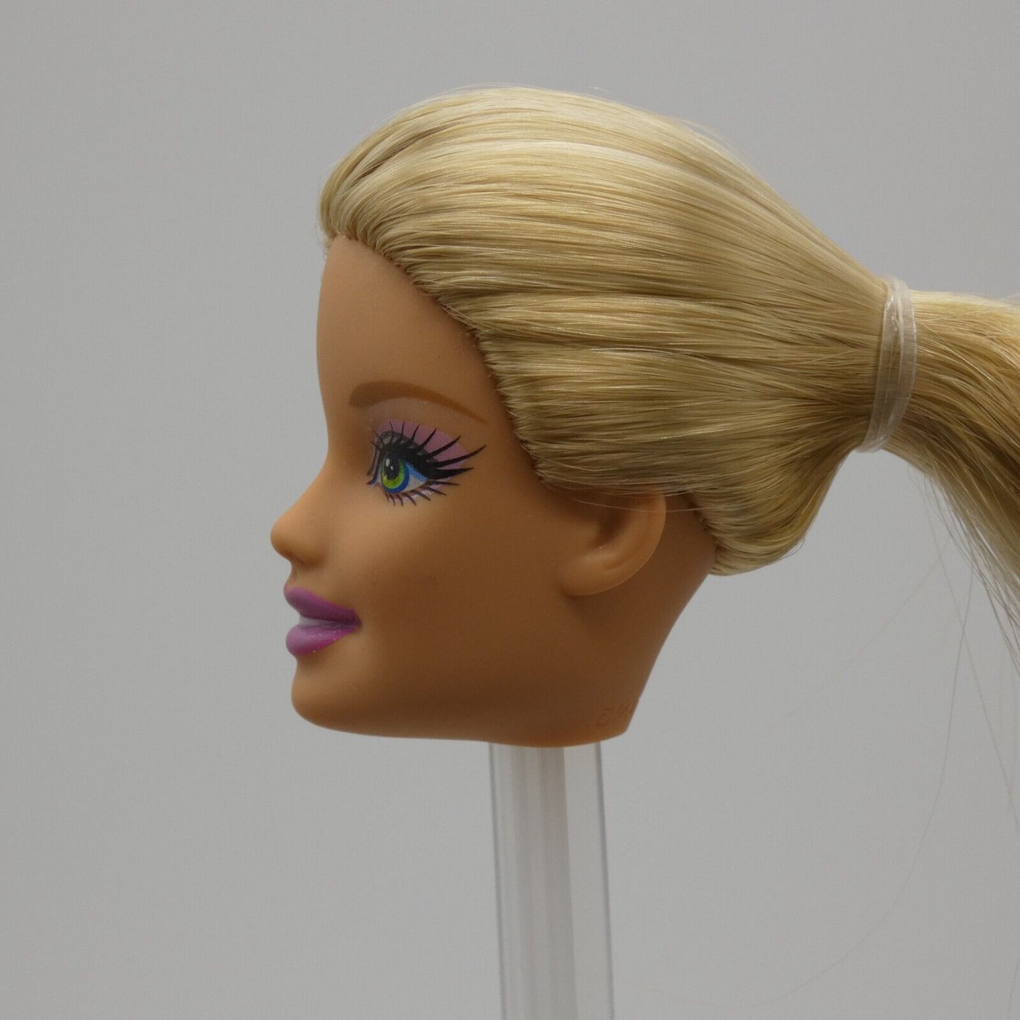 Barbie Doll Generation Girl CEO Face Bright Green Eyes Blonde Light Skin Tone