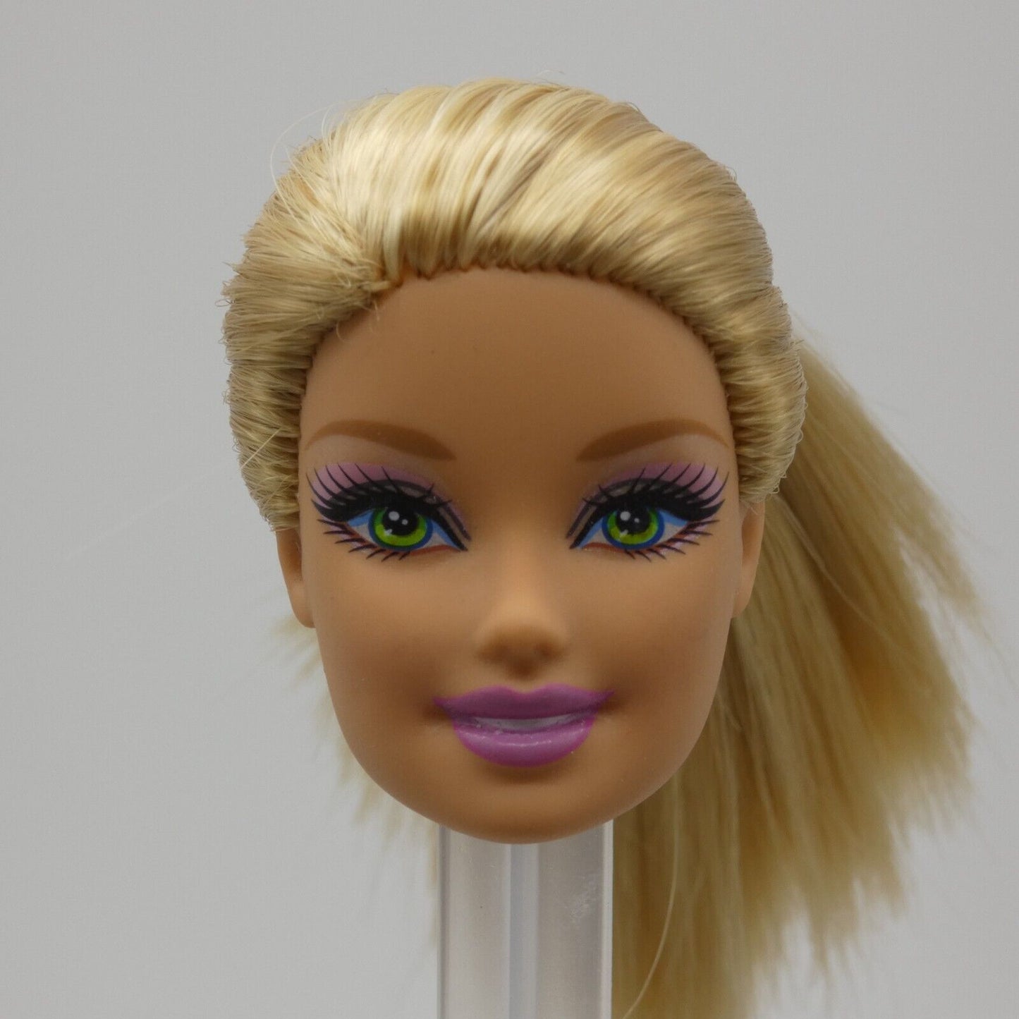 Barbie Doll Generation Girl CEO Face Bright Green Eyes Blonde Light Skin Tone