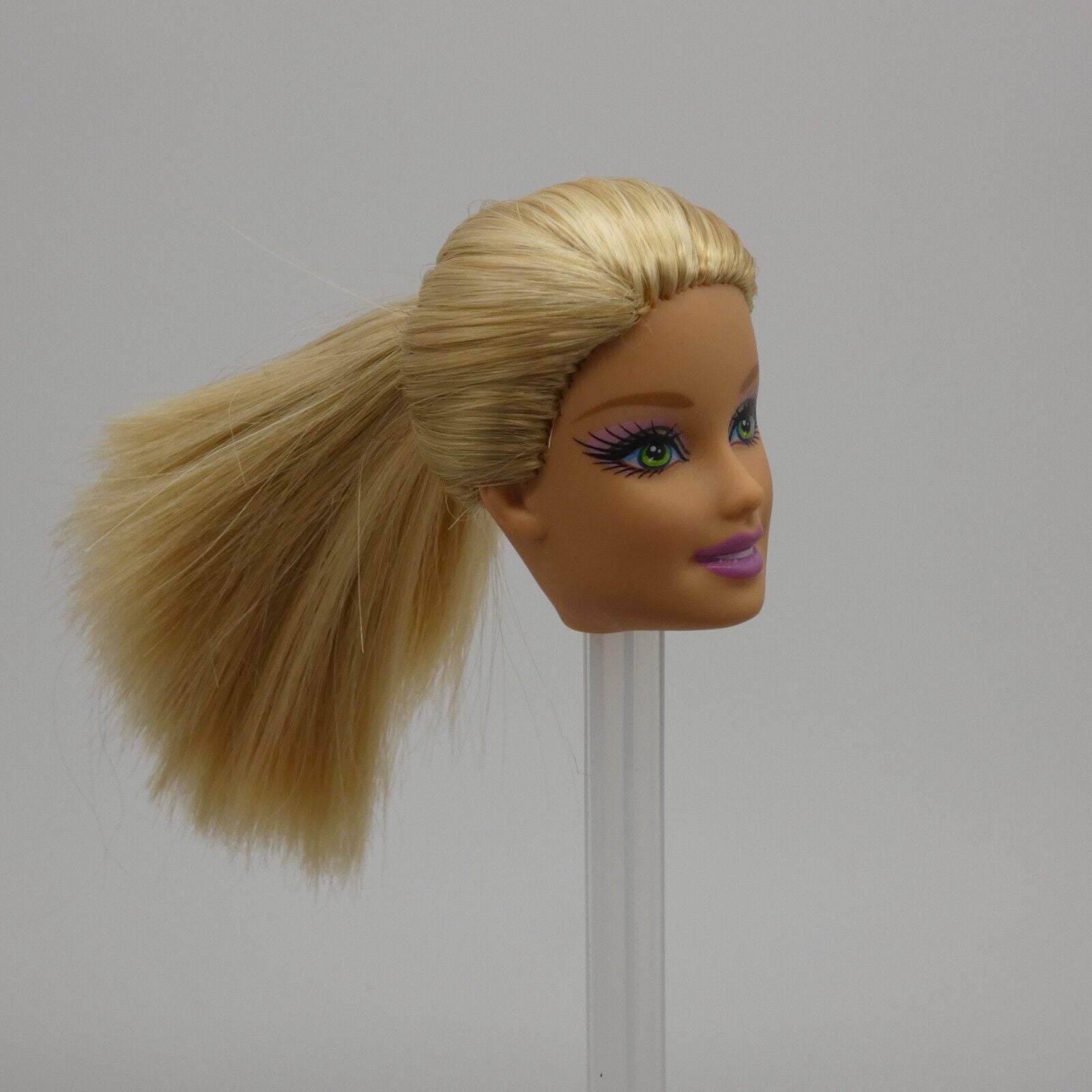 Barbie Doll Generation Girl CEO Face Bright Green Eyes Blonde Light Skin Tone